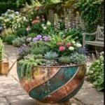 Copper swirl bowl planter with green patina
