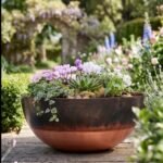 Handcrafted copper bowl planter with green patina